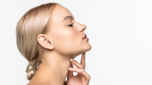 Side profile of woman with smooth skin and chin